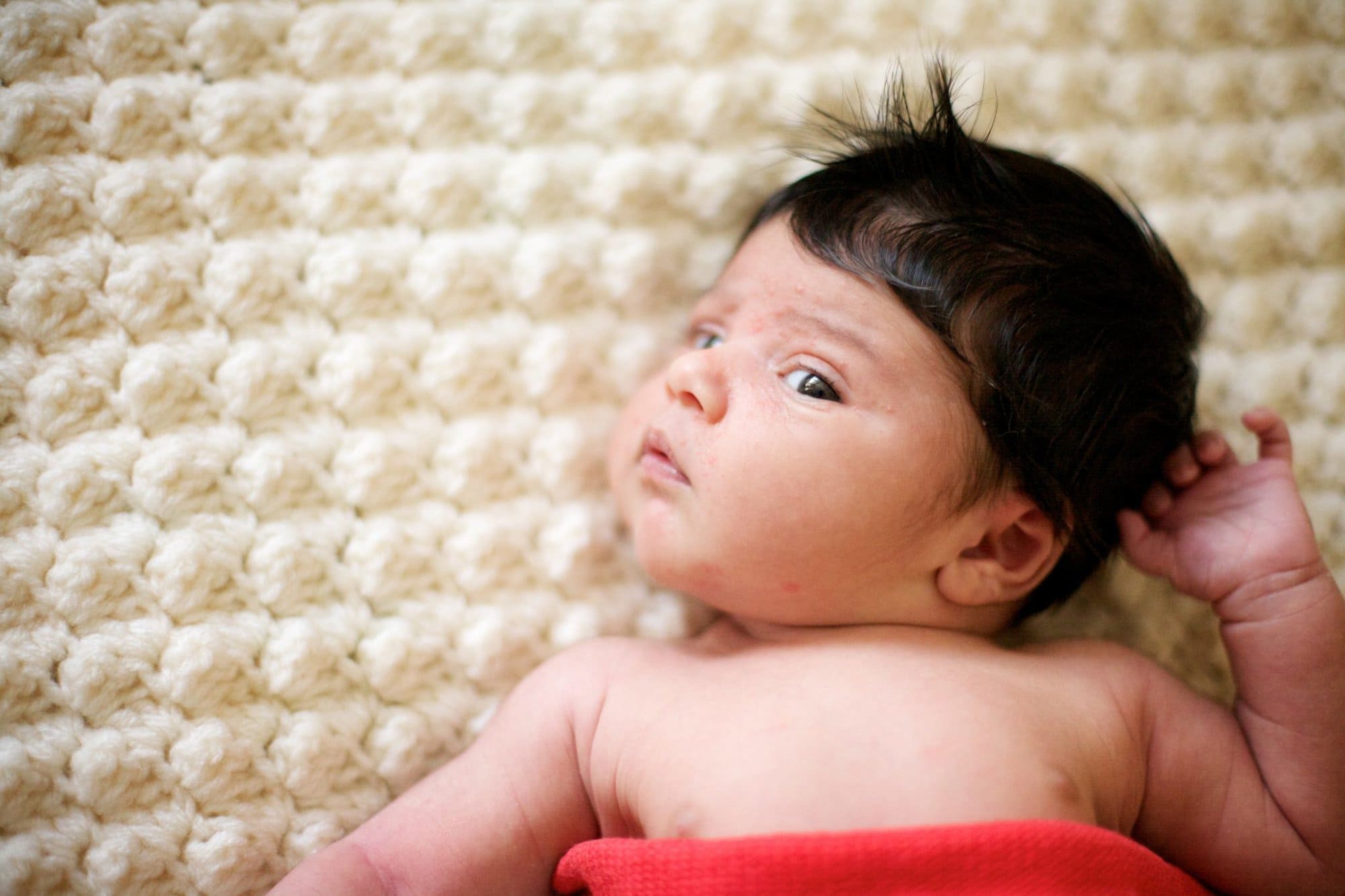 Baby boy in newborn photoshoot in London at home