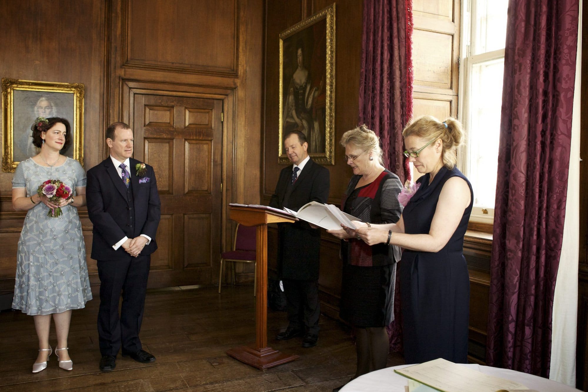 Wedding photography at Admirals House ceremony and readings for wedding couple in Greenwich