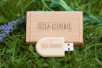 Beckenham Wedding Photographer's USB in wooden box sat on grass