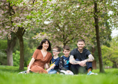 Family spring photoshoot by Beckenham photographer in the blossom of Kelsey Park