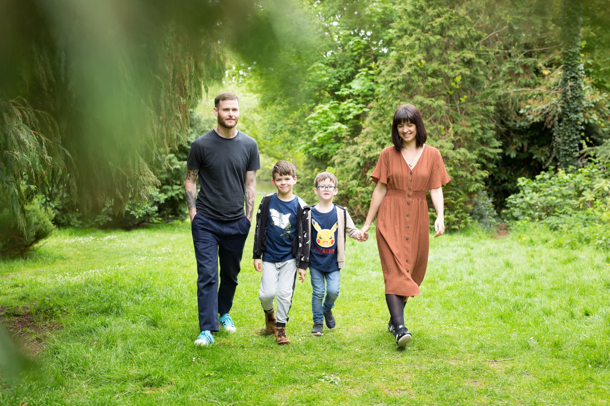 Family walking in a park taken by South East London family photographer in Spring