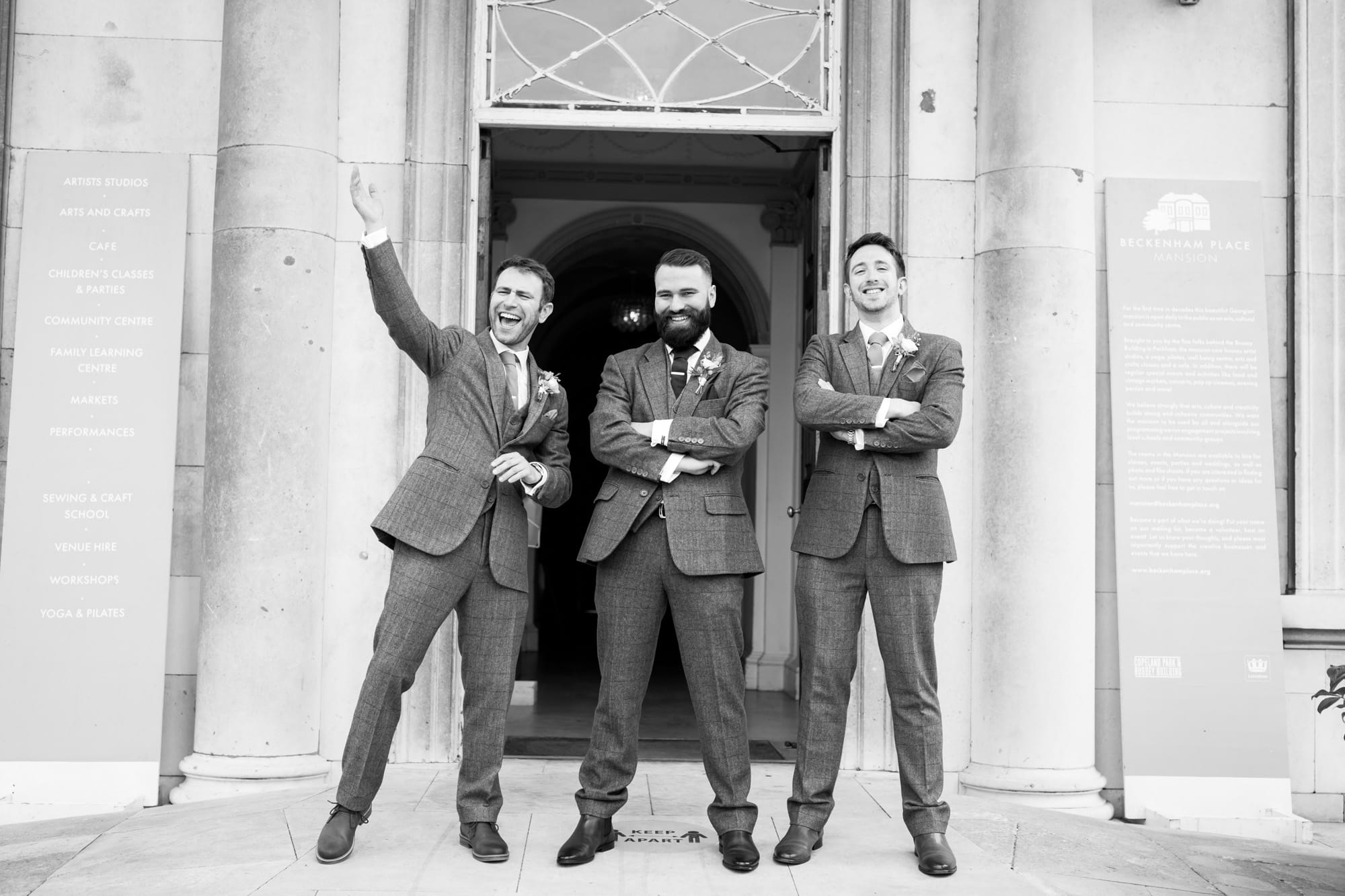 Groom and groomsmen before wedding in black and white Bromley wedding photography image outside Beckenham Place Mansion