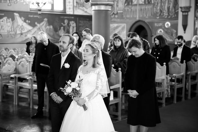 greek orthodox ceremony bride and groom in ceremony at church in Kentish Town taken by London wedding photographer