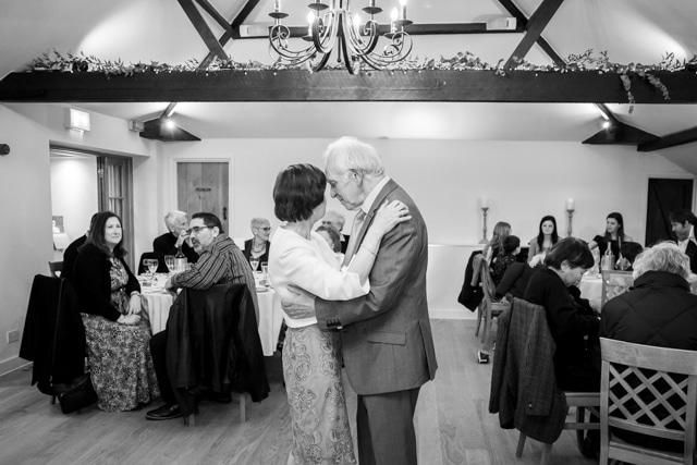 Parents of the groom dancing at wedding reception at Oaks Farm weddings venue in Croydon
