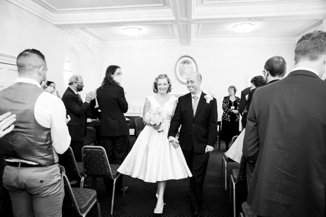 Bromley wedding photography showing a newly married couple in black and white image after their ceremony at Bromley Civic Centre